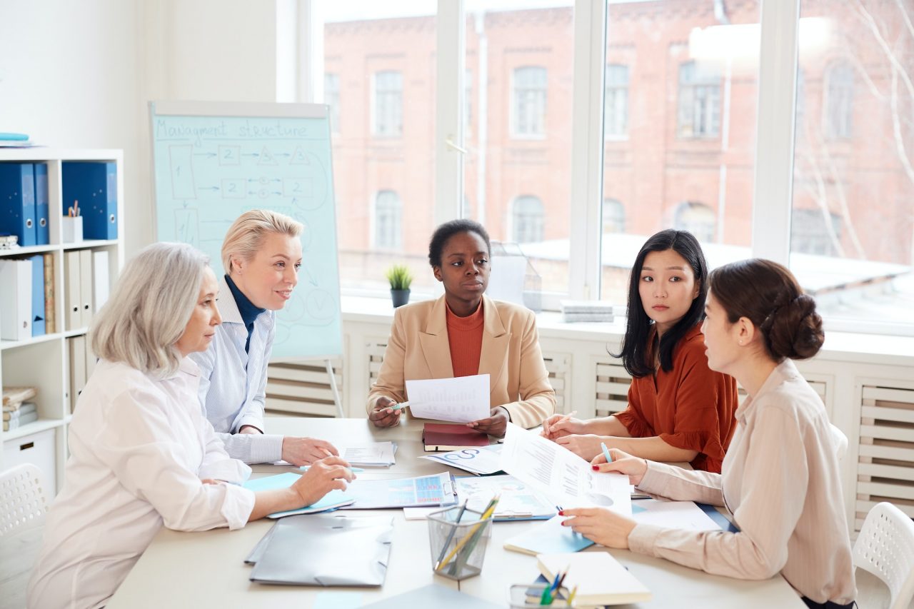 group of businesswomen at meeting in office 1